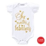 Six months of fabulous golden glitter baby romper