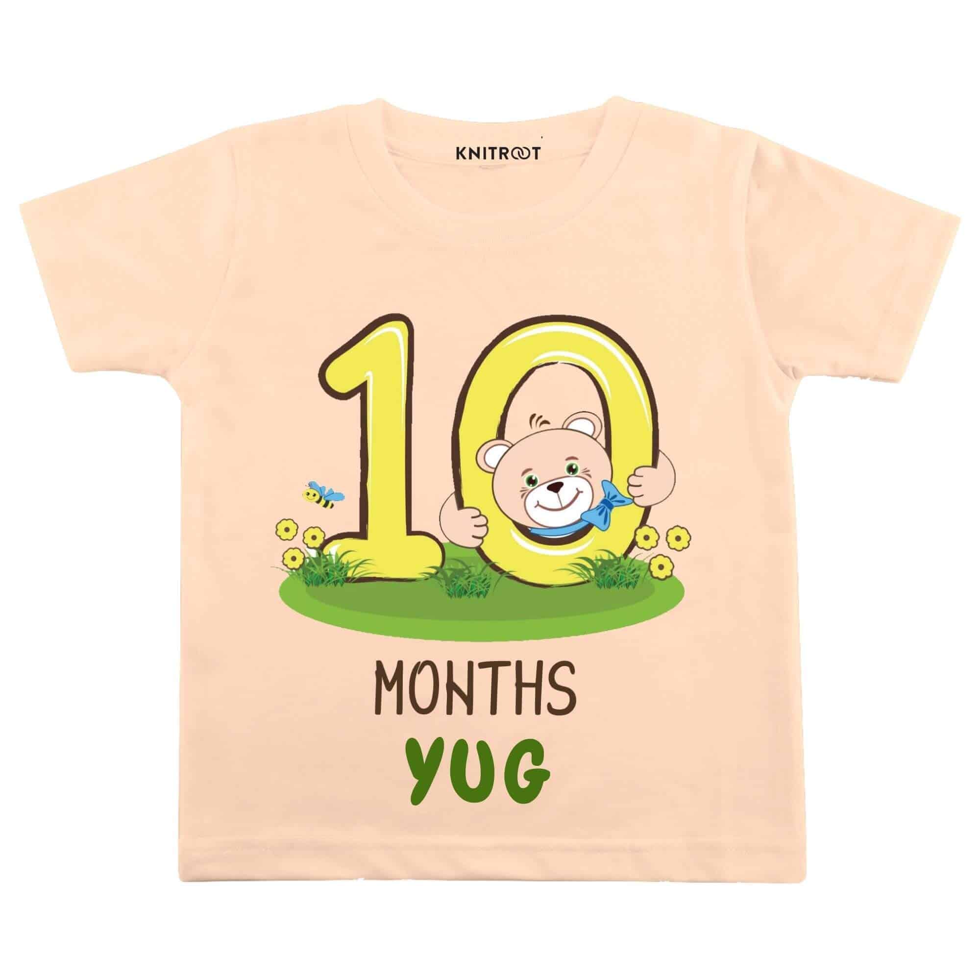 Ten month teddy in peach tee